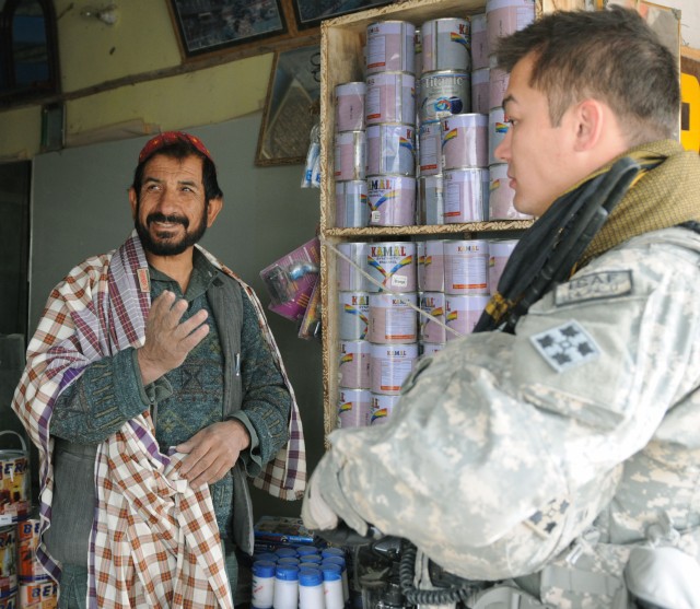 Charlie Company conducts dismounted patrol in Popal colony, in Kandahar City Afghanistan