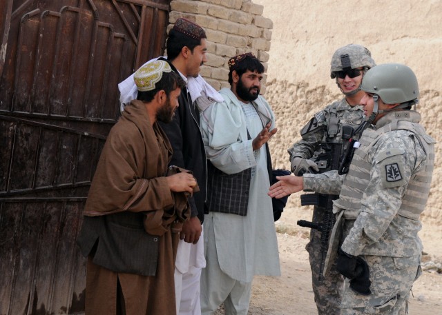 Charlie Company conducts dismounted patrol in Popal colony, in Kandahar City Afghanistan