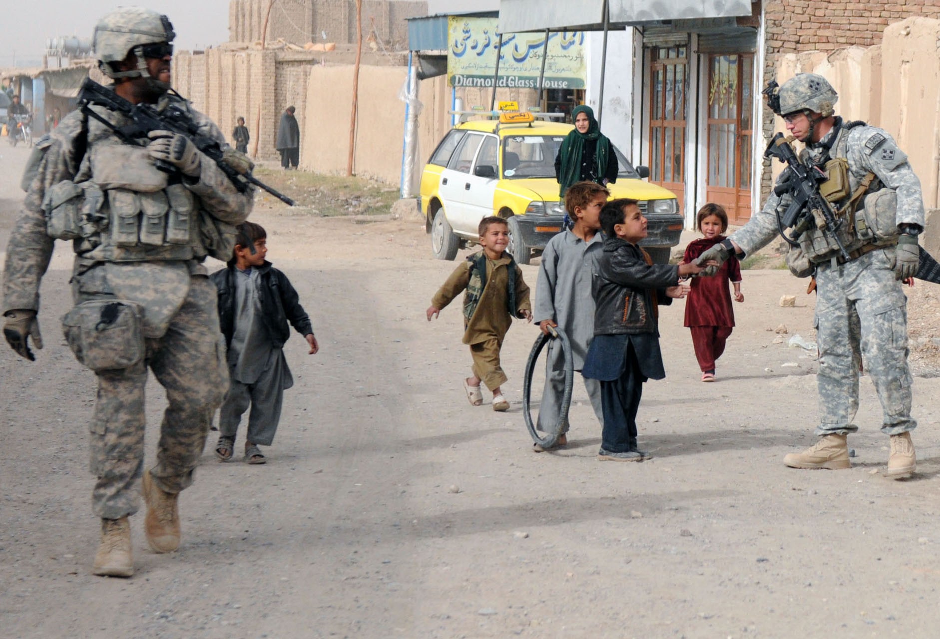 Charlie Company conducts dismounted patrol in Popal colony, in Kandahar ...