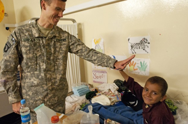 Army medics help boy back on his feet