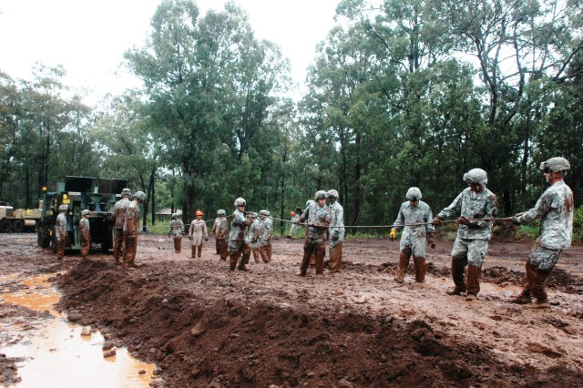 CAB Soldiers fight through muddy BNCOC