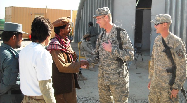 AF colonel promotes Army son in Afghanistan