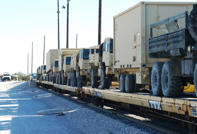 FORT HOOD, Texas- Various types of vehicles loaded on flatbed train cars wait to be shipped to the Joint Readiness Training Center in Fort Polk, La. The vehicles were loaded by Soldiers from the 2nd Brigade Combat Team, 1st Cavalry Division during th...