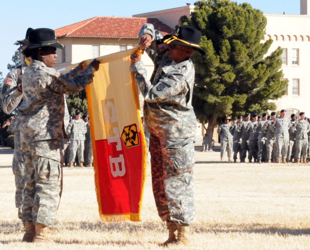 Lt. Col. Litonya Wilson, commander, 15th Special Troops Battalion, 15th Sustainment Brigade and Command Sgt. Maj. Dolishia King, the battalion’s sergeant major, uncases the battalion’s colors during an Uncasing Ceremony on Noel Field here Dec...