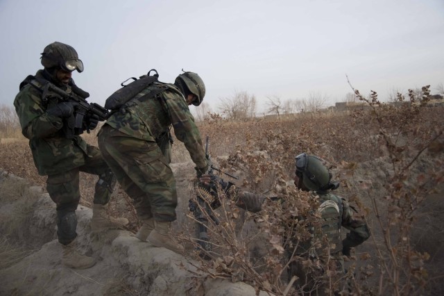 Afghan Commandos, Border Police secure explosives in joint Kandahar clearing operation