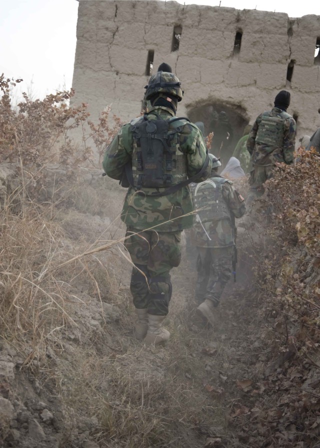 Afghan Commandos, Border Police secure explosives in joint Kandahar clearing operation