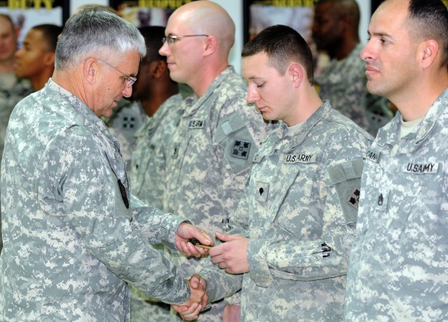 A coin for Spc. Curtis.