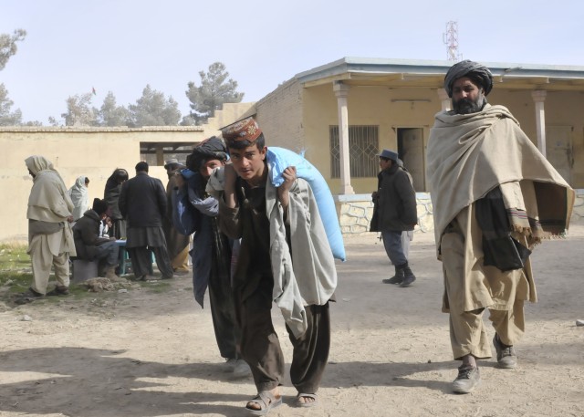 Local farmers receive wheat seed and fertilizer at Spin Boldak District Center