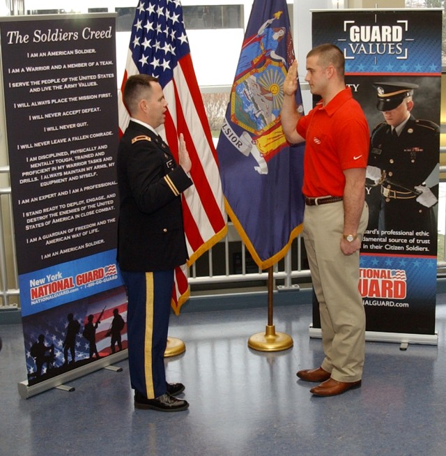 Olympic gold medalist enlists in Army National Guard