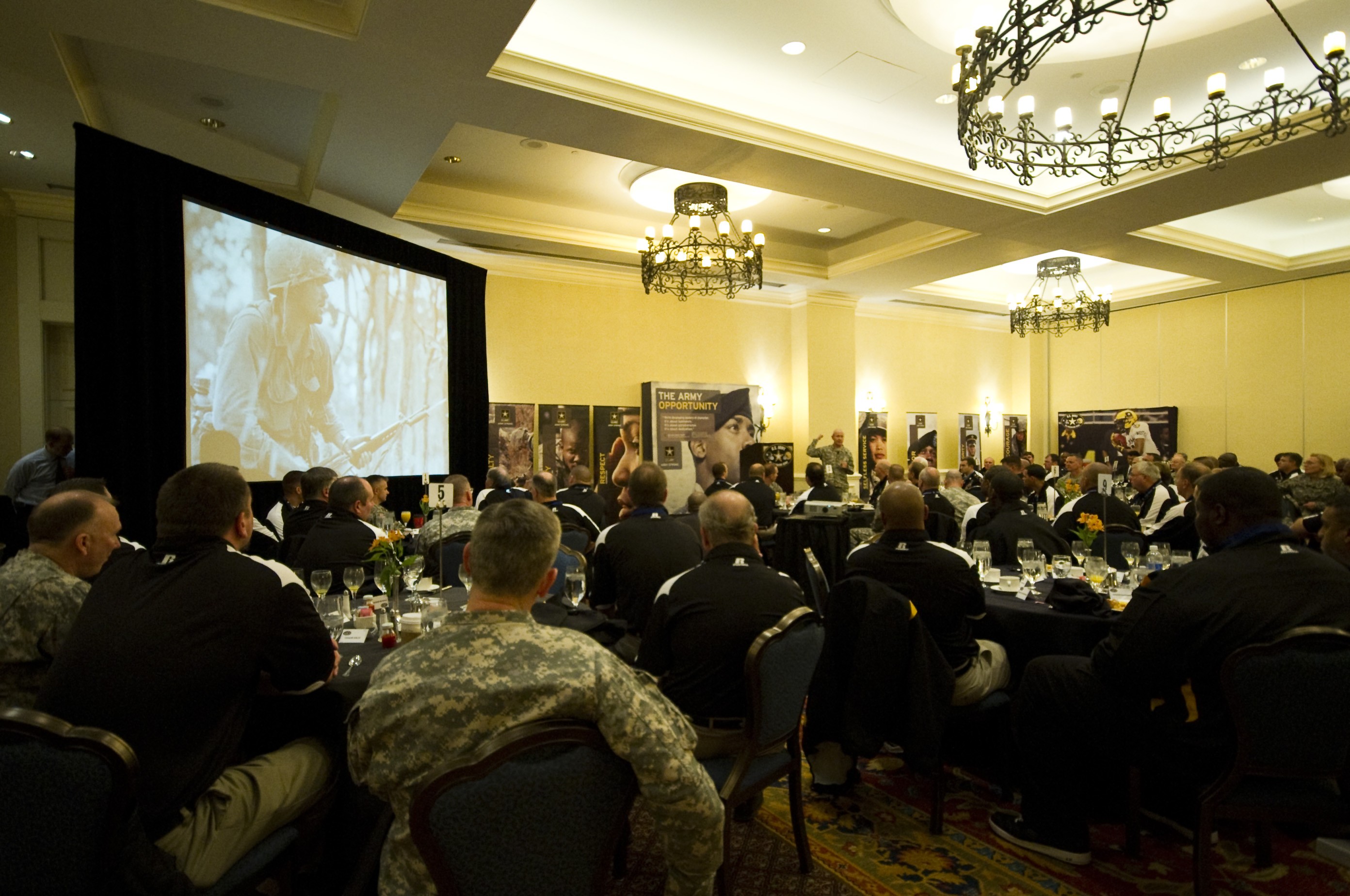 Gen. Dempsey speaks with West Point football players after their