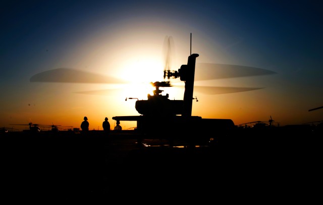 AH-64 Apache at sunset