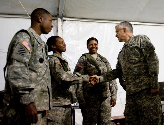 Chief of Staff of the Army Gen. George W. Casey Jr. greets Soldiers with 3rd Brigade Combat Team, 25th Infantry Division, at the National Training Center (NTC) in Ft. Irwin, CA, on Jan. 22, 2011.  The mission of the NTC is to provide  realistic,...