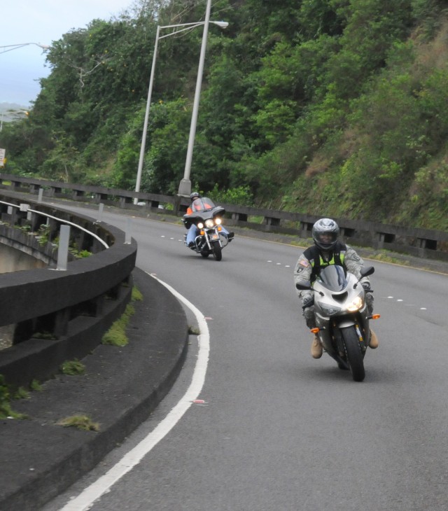 Soldiers demonstrate safe motorcylce riding