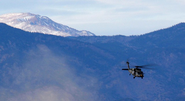 FORT CARSON, Colo.-A UH-60A Black Hawk helicopter from the 1st Air Cavalry Brigade, 1st Cavalry Division, takes to the skies during high altitude, mountain environmental training near Fort Carson, Colo., Jan. 18. The pilots and crew chiefs of the...
