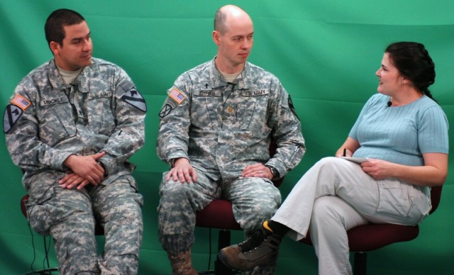 FORT POLK, La. - Chaplain (Maj.) Donald Ehrke (center), brigade chaplain, and Staff Sgt. Timothy Muckle (left), a chaplain's assistant with the 2nd Brigade Combat Team, 1st Cavalry Division, conduct an on-camera interview with a role-playing reporter...