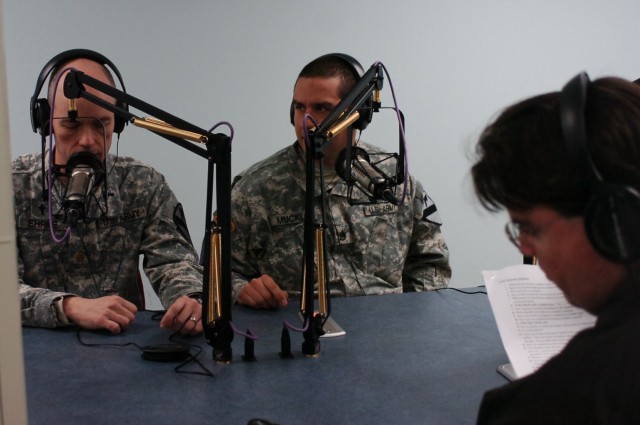 FORT POLK, La. - Chaplain (Maj.)  Donald Ehrke (left), brigade chaplain, and Staff Sgt. Timothy Muckle (center), a chaplain's assistant with the 2nd Brigade Combat Team, 1st Cavalry Division, conduct a radio interview with a role-playing reporter dur...