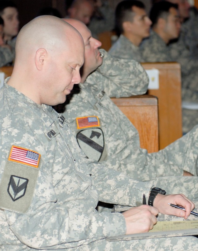 FORT HOOD, Texas- Lt. Col. Matthew Opalinski, a member of the stability transition team for 3rd Brigade Combat Team, 1st Cavalry Division, takes notes during a Leader Development and Education for Sustained Peace seminar Jan. 20. Leaders throughout t...