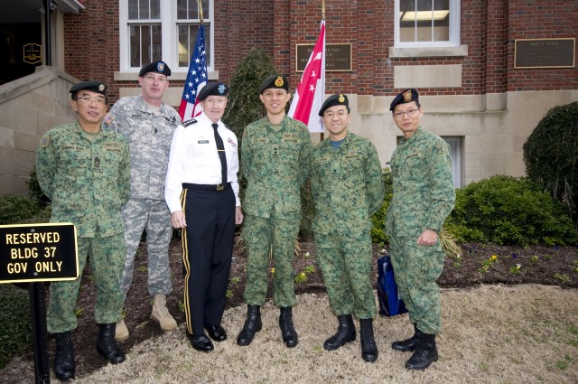 Gen. Martin Dempsey, Maj. Gen. Chun Sing Chan, Command Sgt. Maj. David Bruner at TRADOC HQ