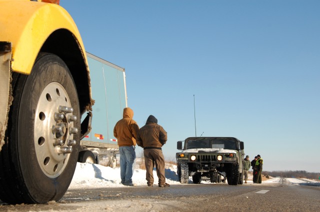 Illinois National Guard, State Troopers assist stranded motorists