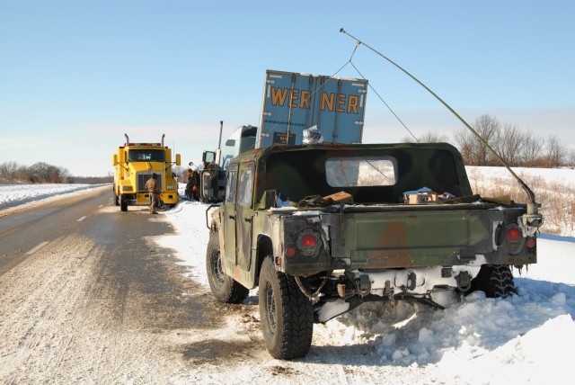 Illinois National Guard, State Troopers assist stranded motorists
