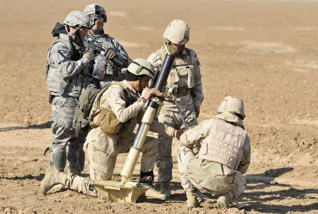 U.S. Soldiers supervise mortar training