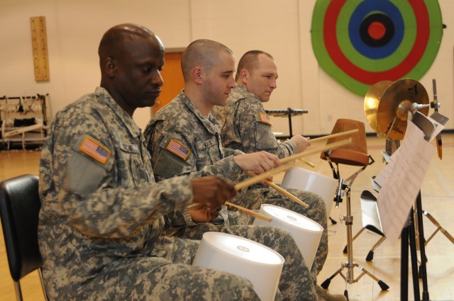 FORSCOM band coaches students while performing its community outreach mission