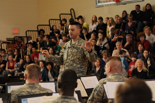 FORSCOM band coaches students while performing its community outreach mission
