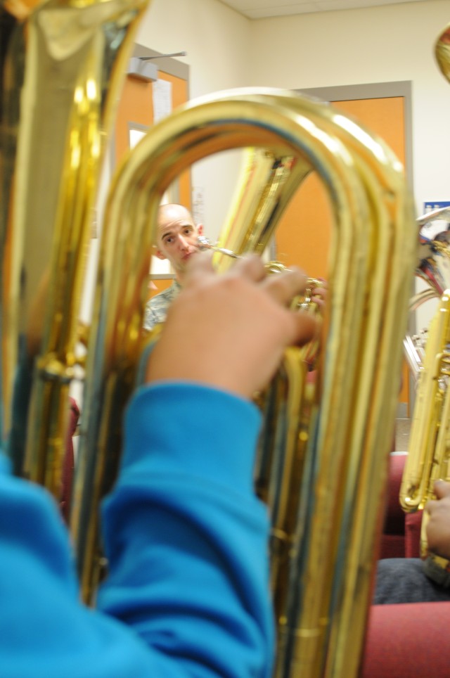 FORSCOM band coaches students while performing its community outreach mission