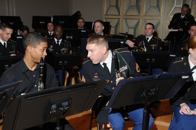 FORSCOM band coaches students while performing its community outreach mission