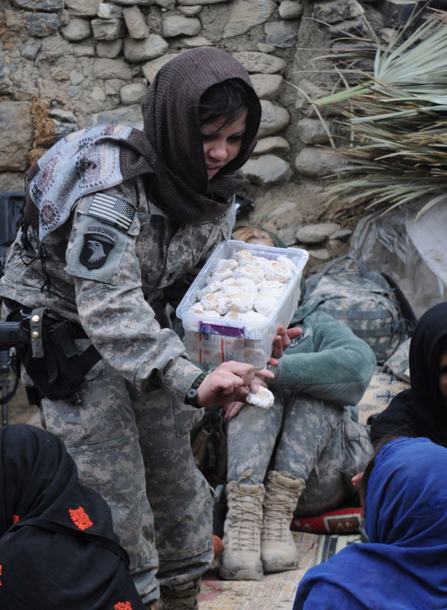 Military women trade combat for cookies and women's peace shura.