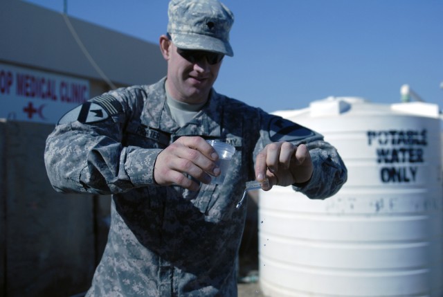 CONTINGENCY OPERATING SITE MAREZ, Iraq - Spc. Nyan Prater, a...