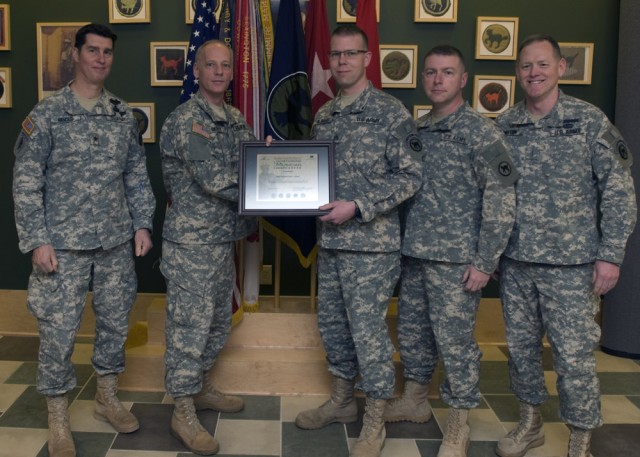 Staff Sgt. Chad J. Alward receives award