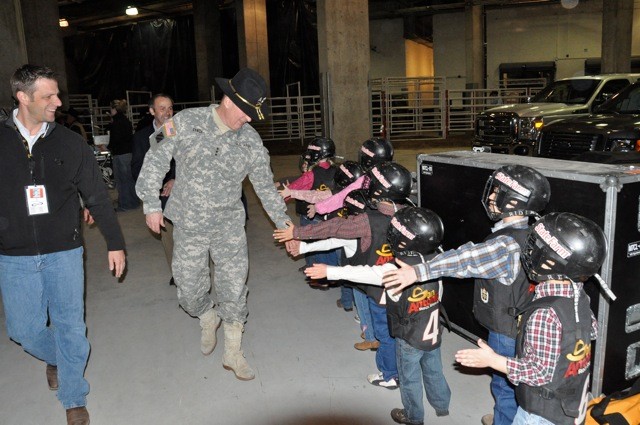 IMCOM commanding general swears in Army's newest recruits at the San  Antonio Stock Show and Rod, Article