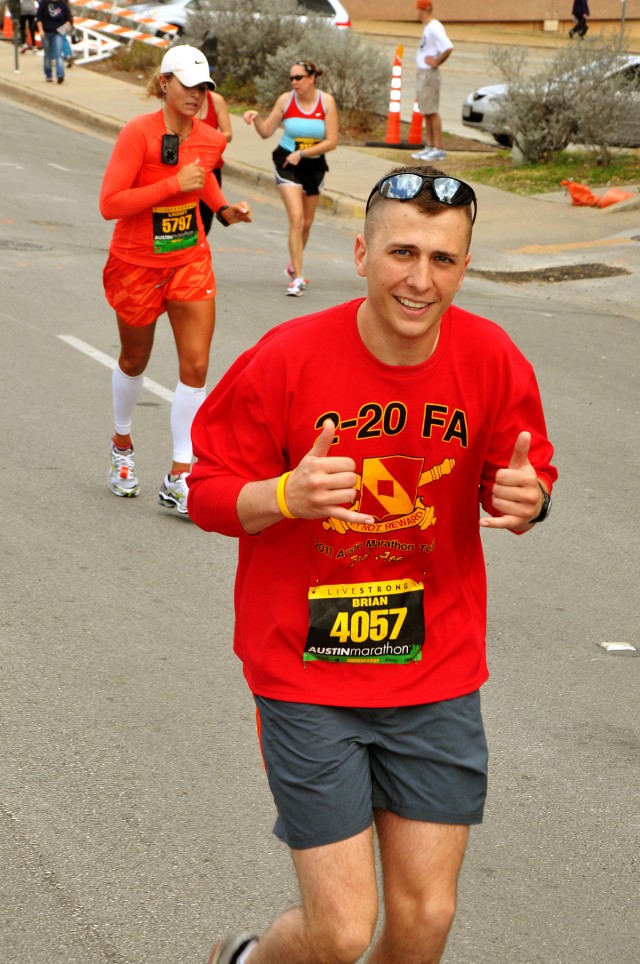 AUSTIN, Texas-2nd Lt. Brian Laborde ,with Battery C, 2nd Battalion, 20th Field Artillery Regiment, keeps a cool composure at the 200 meter mark during the Live Strong Austin Marathon held downtown Austin, Texas, Feb. 20. Laborde breezed through...