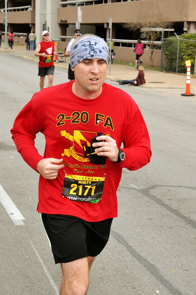 AUSTIN, Texas-Sgt. 1st Class Rhett Massey, with Battery C, 2nd Battalion, 20th Field Artillery, pickes up his speed at the 800 meter mark during the Live Strong Austin Marathon held downtown Austin, Texas, Feb. 20. Massey helped to develop the...