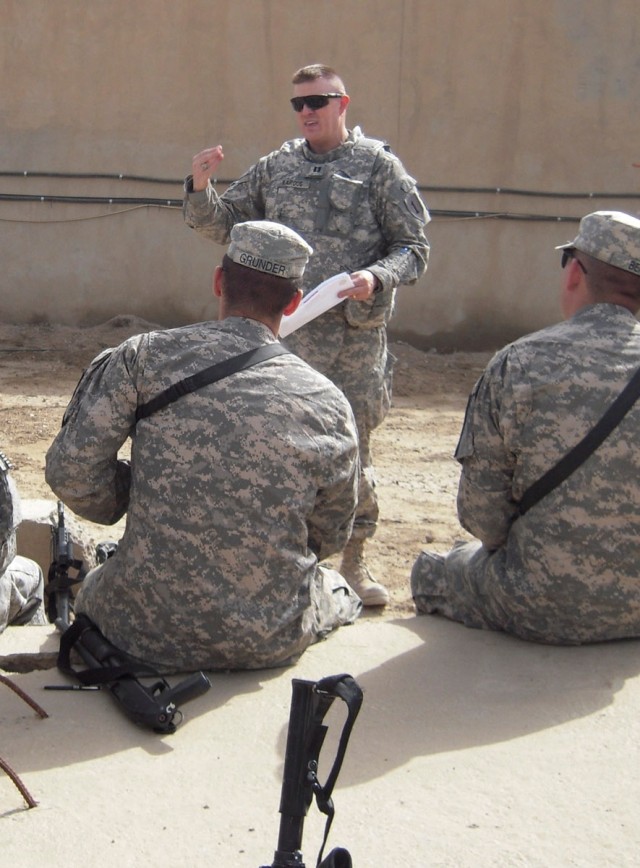 BAGHDAD, Iraq -Troopers with 6th Squadron, 9th Cavalry Regiment, attached to 2nd Advise and Assist Brigade, 1st Infantry Division, United States Division - Center, receive instruction on non-lethal weapons and their purpose in our advise and...