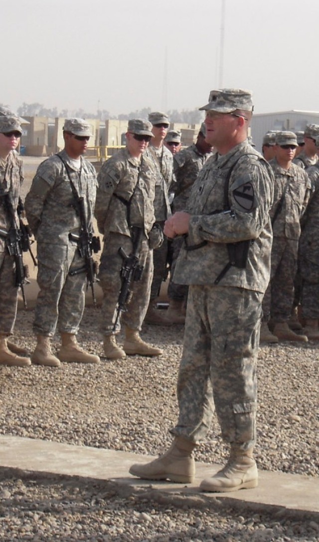 BAGHDAD, Iraq - Lt. Col. Cameron Cantlon, commander of 6th Squadron, 9th Cavalry Regiment, 2nd Advise and Assist Brigade, 1st Infantry Division, United States Division - Center, addresses the formation during the uncasing ceremony Feb. 23 at Camp...