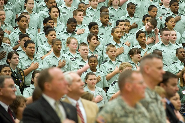 Junior Leadership Corps Cadets during the National Anthem at the beginning of the launch ceremony for project Pass at North Middle School in Radcliff, Ky., on Mar. 11, 2011.  The goal of the project PASS is to develop leadership and academic skills f...