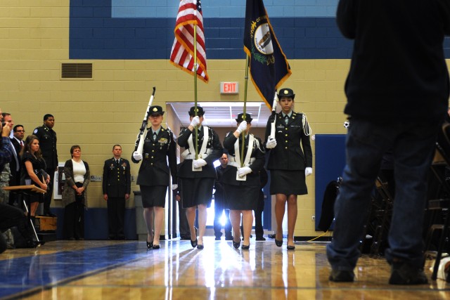 Junior Reserve Officer Training Corps Cadets present the American and Kentucky flags at the start of the National Launch Ceremony for project Pass at North Middle School in Radcliff, Ky., on Mar. 11, 2011.  The goal of the program is to develop leade...