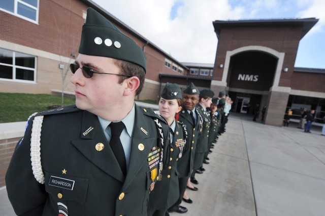 Junior Reserve Officer Training Corps Cadet Richardson and his fellow Cadets await the arrival of Secretary of Education Arne Duncan and Chief of Staff of the Army Gen. George W. Casey Jr., at North Middle School in Radcliff, Ky., on Mar. 11, 2011.  ...