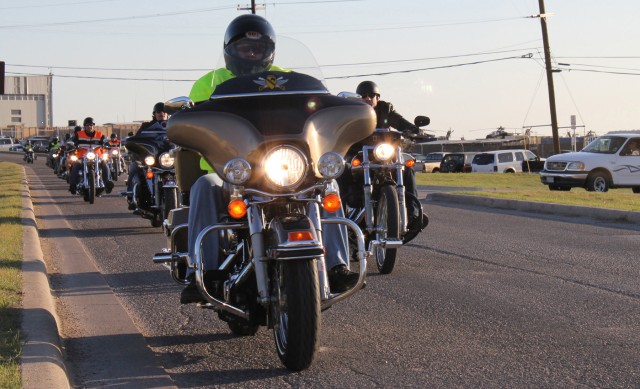 FORT HOOD, Texas - Command Sgt. Maj. Glen Vela, of Fort Worth, Texas, 1st Air Cavalry Brigade, 1st Cavalry Division, leads Soldiers from his brigade on a motorcycle ride March 9. Participating in the ride included Theo Rossi and Kim Coates, stars of ...