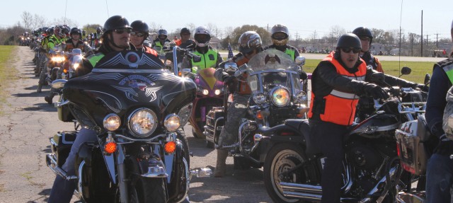 FORT HOOD, Texas - Kim Coates (left), and Theo Rossi (right), stars of the show "Sons of Anarchy", prepare to embark on a motorcycle mentorship ride along with Fort Hood Soldiers March 10. The purpose of the ride was to promote motorcycle safety whic...
