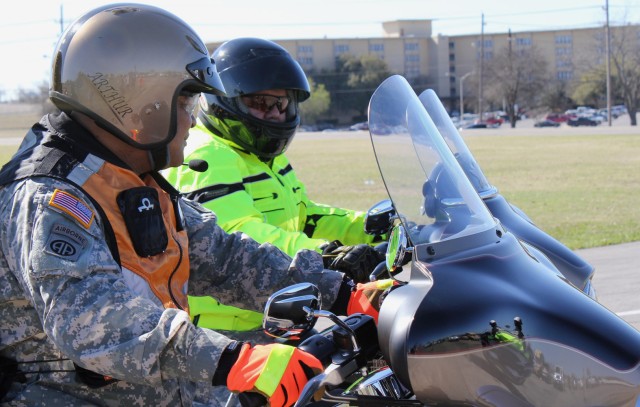 FORT HOOD, Texas - Command Sgt. Maj. Arthur Coleman, III Corps, (left), and Command Sgt. Maj. Glen Vela, 1st Air Cavalry Brigade, serve as lead riders during a post-wide motorcycle mentorship ride, March 10. The ride took the Soldiers from III Corps ...