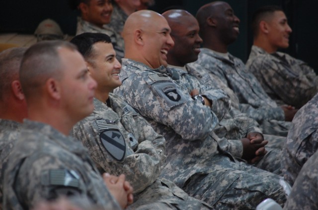 CONTINGENCY OPERATING SITE MAREZ, Iraq - Soldiers assigned to 2nd Battalion, 7th Cavalry Regiment, 4th Advise and Assist Brigade, 1st Cavalry Division, share a laugh during the "It's Not That Time of the Month" All Female Comedy tour at Joint...