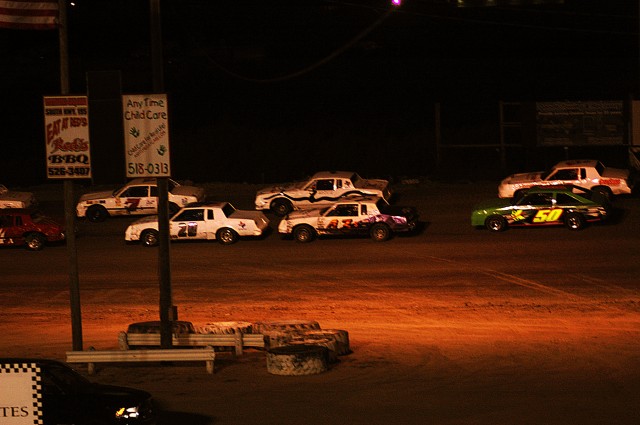 KILLEEN, Texas- Retired Chief Warrant Officer Vernon 'Buck' Owens, from Cedar Park, Texas, waits in line for the debris on the speedway to clear during his feature stock car race at the opening night during the Texas Thunder Speedway, March12....