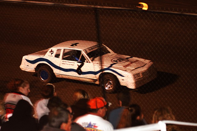 KILLEEN, Texas - Retired Chief Warrant Officer Vernon 'Buck' Owens, from Cedar Park, Texas, drives his stock car supporting Racing Against Drugs during opening night at Texas Thunder Speedway, March12.  Eight Soldiers of 1st Battalion, 21st Field...