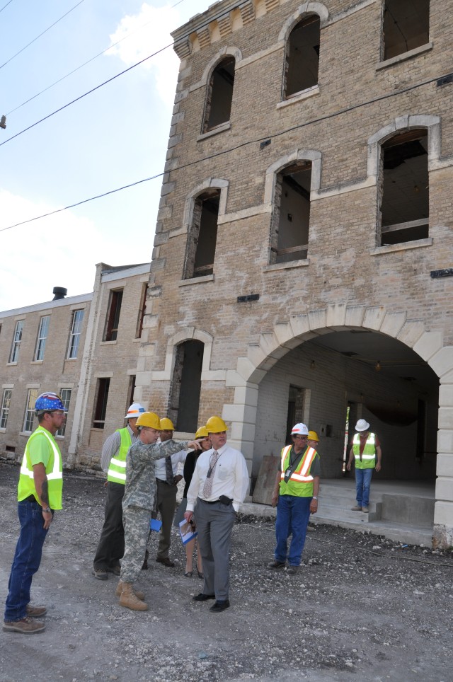 Jeffrey P. Parsons (right) and Brig. Gen. Stephen B.
Leisenring view ongoing renovations at the Long Barracks March 16, 2011, at Fort Sam Houston, Texas. The Long Barracks will be the future home of the Mission and Installation Contracting Command. M...