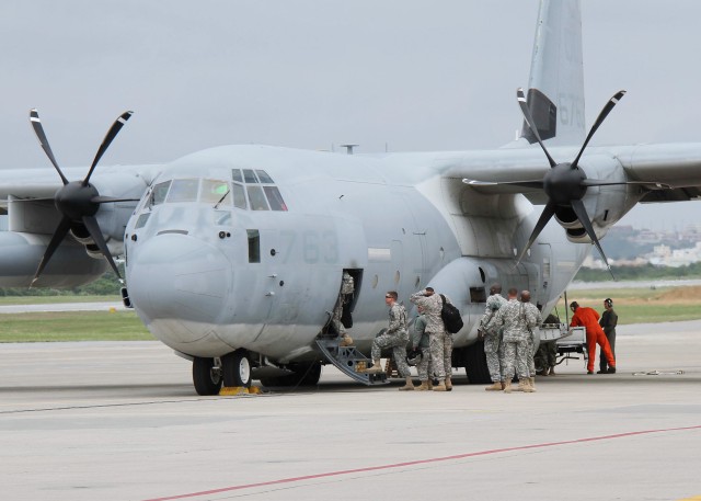 Boarding C-130 