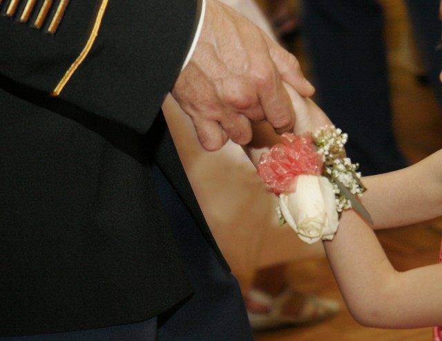Daughters dance with their heroes