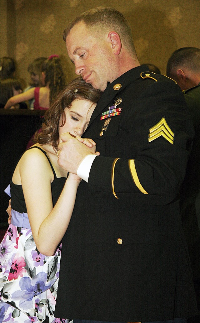 Daughters dance with their heroes